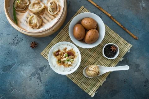 Chinese Streamed Dumpling with tea eggs and porrige Stock Photos