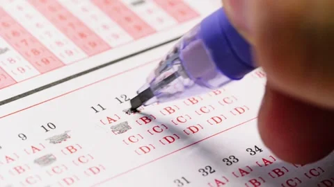 Chinese students fill in answer sheets during exams Vidéo 311937488