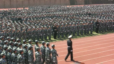 Chinese students march and salute Stock Footage