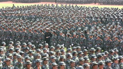 Chinese students take part in military parade Stock Footage