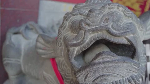 A Chinese style stone carving lion at the front of a temple door in Taiwan. Stock Footage 140221153