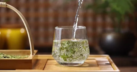 Chinese Tea Ceremony Brewing Longjing Dragon Well Green Tea 4K Close Up Stock Footage 346472022