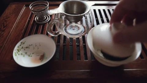Chinese tea ceremony on tea table, close up, toned video Stock Footage 83196995