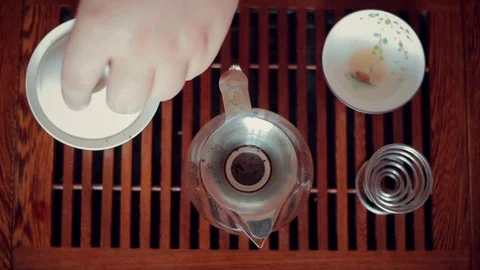 Chinese tea ceremony on tea table, close up, toned video Stock Footage 83197013