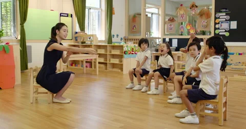 Chinese teacher teaching a class in classroom,4K Stock Footage 146837649