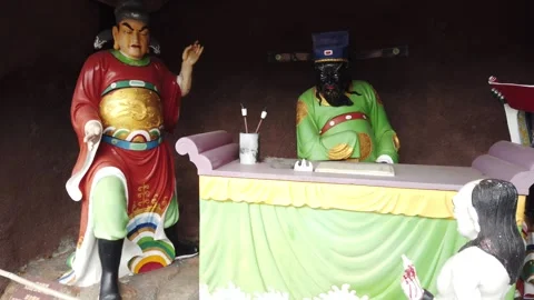 Chinese Temple Hell Punishment Statues Depicting Afterlife Judgment Stock Footage 333919557
