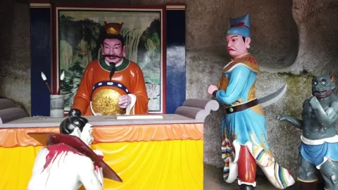 Chinese Temple Hell Punishment Statues Depicting Afterlife Judgment Stock Footage 333919565