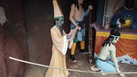 Chinese Temple Hell Punishment Statues Depicting Afterlife Judgment Stock Footage 333919590