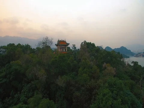 Chinese temple on top of  hill on background of lake Stock-Footage 71548879
