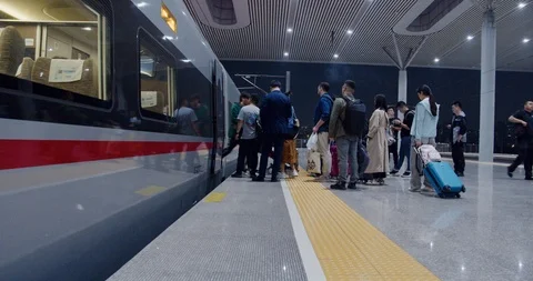 Chinese Tourists Queue for High Speed Trains in Hanghzhou Railway Station Stock Footage 118442836