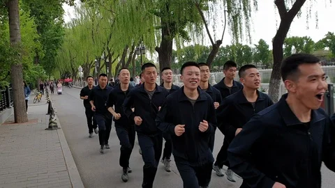 Chinese unit of men running for exercise. Beijing. Stock Footage 111948410
