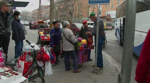 Chinese vendors on sidewalk Stock Footage 45669406