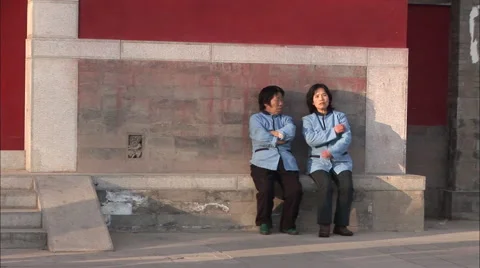 Chinese waitresses on a break, chatting Stock Footage 56649175