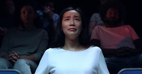 A Chinese woman in a movie theatre Stock Video Pond5