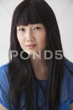 Chinese woman with serious face Stock Photos