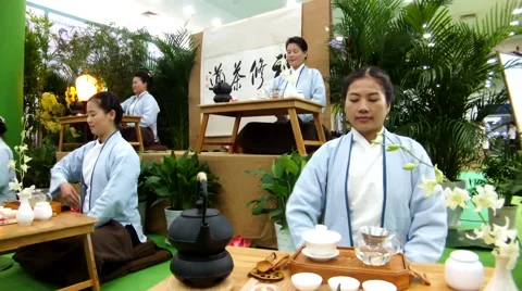 Chinese women in meditation tea art performance Stock Footage