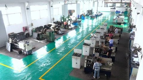 Chinese worker are working on machine tool  in factory Stock Footage 75846139