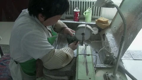 Chinese worker creating a jade ornament close, 4K. Stock Footage 79634607