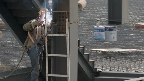 Chinese Worker Welding in Slow Motion Stock Footage 224355523