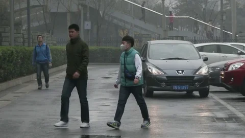 Chinese workers arrive at work in early morning. Stock Footage