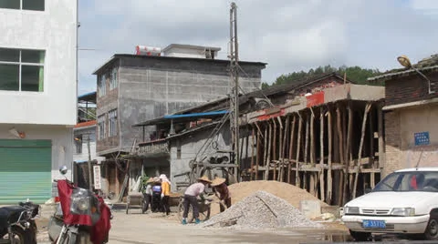 Chinese workers constructing building Video stock 22606738