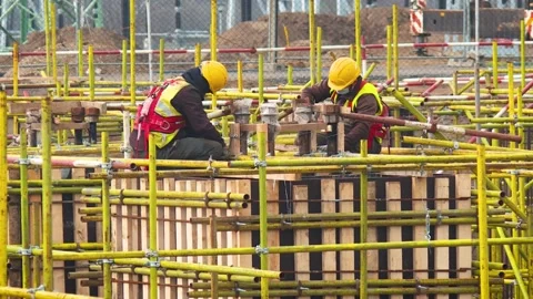 Chinese workers on construction site during pandemic Stock Footage 145588685