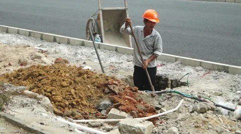 Chinese workers in pavement construction Stock Footage 54712422
