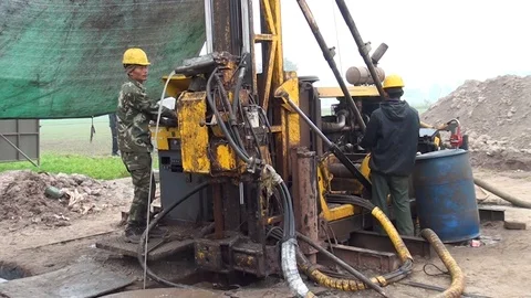 Chinese Workers Rock Mining, Operating Machinery. Stock Footage 120678126