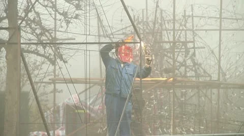 Chinese Workers Welding Lanterns Stock Footage