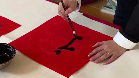 The Chinese write calligraphy. Couplet in characters "福" (fortune). Stock Footage 200439569