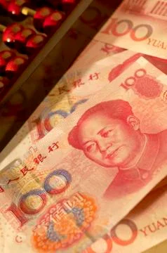 Chinese yuan notes with abacus Stock Photos