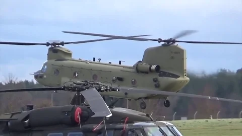 Chinook hovering during traffic pattern training flight with Chinook helicopter Video stock 83544395