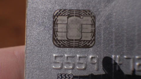 Chip close up macro extreme on grey credit card Stock Footage 101671112