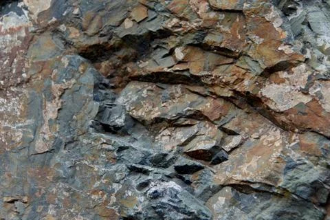 Chip of a multilayered stone Stock Photos