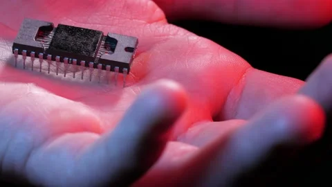 Chip on a palm of a man Video stock 130770512