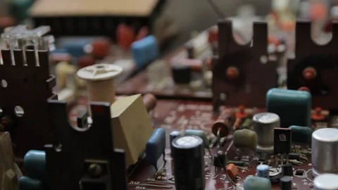 Chip radio components mounted on the PCB with soldering iron Stock Footage 85328232
