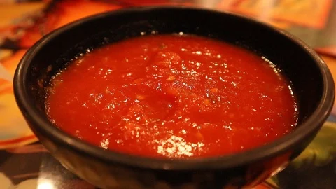 Chip Scooping Salsa in Mexican Restaurant in USA 動画素材 126945573