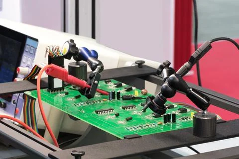 Chip testing equipment. A close-up study of a test sample of a transistor chi Stock Photos