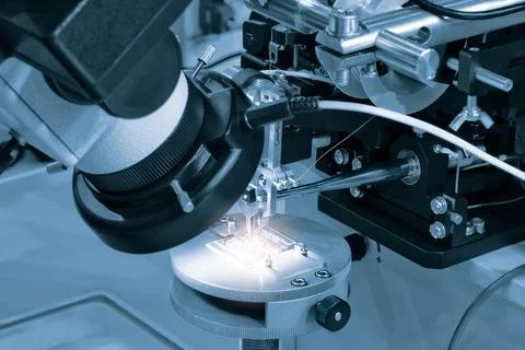 Chip testing equipment. Manufacturing of microchips. A close-up study of a te Stock Photos