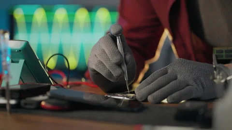 Chip. Workshop worker uses professional skills holding a screwdriver in his Stock Footage 278411878