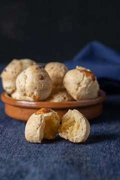 Chipa, typical Paraguayan cheese bread, open to the middle Stock Photos