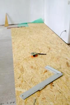 Chipboard floor installation Stock Photos