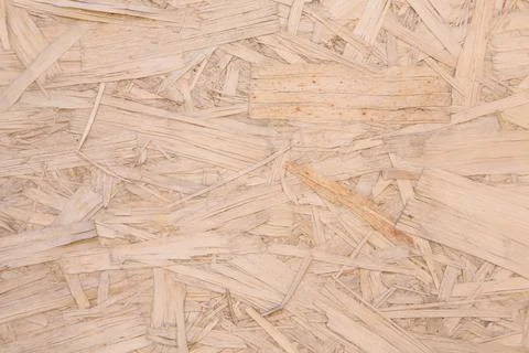 Chipboard plywood. pressed wood close-up. Background: wood shavings. copy spa Stock Photos