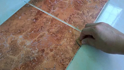 Chipped floor tiles Stock Footage 231836998