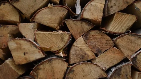 Chipped logs for stove background. stacked firewood Stock Footage 131958451