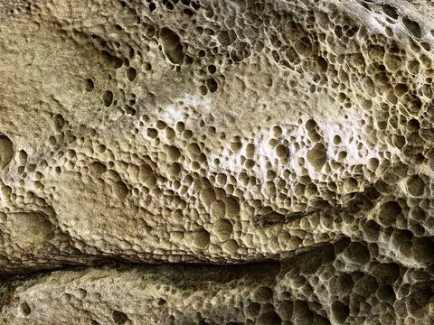 Chipped old rock background texture Stock Photos