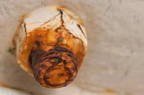 Chipped paint and rust on old nut and bolt Foto stock