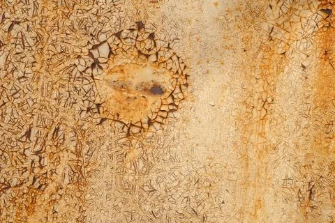 Chipped paint on iron surface, rusty metal texture, background Stock Photos