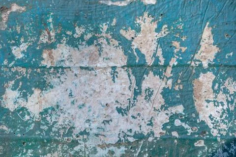 Chipped paint on an old plaster wall, texture background Stock Photos