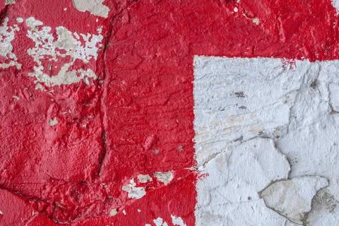 Chipped paint on an old plaster wall, texture background Stock Photos